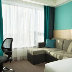 Гостиница Hampton by Hilton Moscow Strogino (Хэмптон бай Хилтон) в Москве - забронировать гостиницу Hampton by Hilton Moscow Strogino (Хэмптон бай Хилтон), цены и фото номеров Москва комната для гостей фото 3