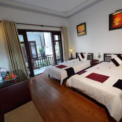 Отель Hoian Salute Hotel and Villa Вьетнам, Хойан - отзывы, цены и фото номеров - забронировать отель Hoian Salute Hotel and Villa онлайн комната для гостей фото 2