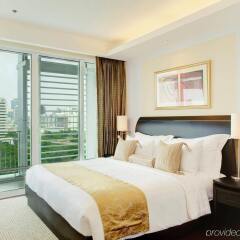 Dusit Suites Hotel Ratchadamri, Bangkok комната для гостей фото 3
