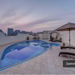 Апартаменты Skyline Deluxe Apartment бассейн
