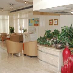 Отель Al Buhaira Hotel Apartments ОАЭ, Шарджа - отзывы, цены и фото номеров - забронировать отель Al Buhaira Hotel Apartments онлайн интерьер отеля