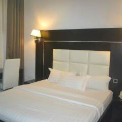 Отель Mac Dove Lounge & Suites ltd комната для гостей фото 2