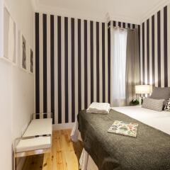 Отель Apartamentos Casa Malasaña Испания, Мадрид - отзывы, цены и фото номеров - забронировать отель Apartamentos Casa Malasaña онлайн комната для гостей фото 3