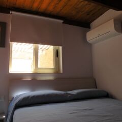 Отель Al Blu Ortigia Apartments Италия, Сиракуза - отзывы, цены и фото номеров - забронировать отель Al Blu Ortigia Apartments онлайн комната для гостей фото 2