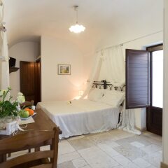 Отель Trulli Family Альберобелло комната для гостей фото 3