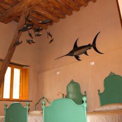 Отель Ostello Artemista Ass. Ostelli Lombardia Сан-Мартино-Сиккомарио интерьер отеля