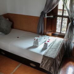 Отель Le Pavillon Oriental комната для гостей