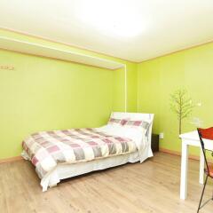 Отель Cozy Place In Itaewon Сеул комната для гостей