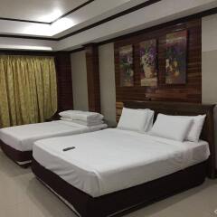 Отель Dumaluan Beach Resort Филиппины, Калапе - отзывы, цены и фото номеров - забронировать отель Dumaluan Beach Resort онлайн комната для гостей фото 2