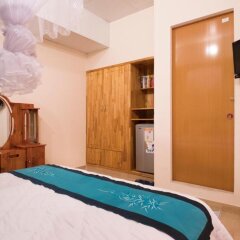 Отель Countryside Moon Homestay сейф в номере