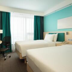 Гостиница Hampton by Hilton Moscow Strogino (Хэмптон бай Хилтон) в Москве - забронировать гостиницу Hampton by Hilton Moscow Strogino (Хэмптон бай Хилтон), цены и фото номеров Москва комната для гостей