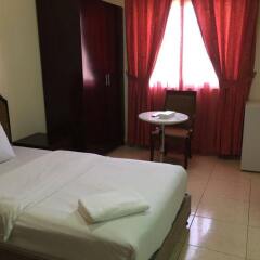 Отель Habib Hotel Apartment ОАЭ, Аджман - отзывы, цены и фото номеров - забронировать отель Habib Hotel Apartment онлайн комната для гостей фото 5