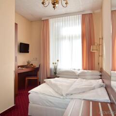 Отель Novum Hotel Kronprinz Hamburg Hauptbahnhof Германия, Гамбург - 2 отзыва об отеле, цены и фото номеров - забронировать отель Novum Hotel Kronprinz Hamburg Hauptbahnhof онлайн комната для гостей фото 2