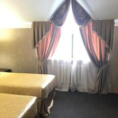 Гостиница Snezhnaya Koroleva Hotel в Черкесске отзывы, цены и фото номеров - забронировать гостиницу Snezhnaya Koroleva Hotel онлайн Черкесск комната для гостей фото 2