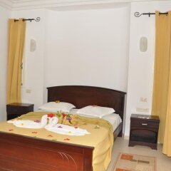 Отель Menzel Dija Appart-Hotel Тунис, Мидун - отзывы, цены и фото номеров - забронировать отель Menzel Dija Appart-Hotel онлайн комната для гостей фото 3