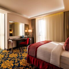 Отель Ramada and Suites by Wyndham Yerevan комната для гостей