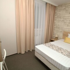 Beliy gorod hotel комната для гостей фото 5