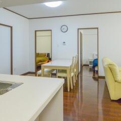 Отель Ocean View Condominium Томигусуку комната для гостей фото 2