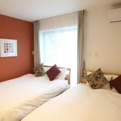 Apartment Hotel Tenjin Tumugu Фукуока комната для гостей