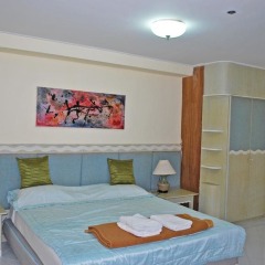 Апартаменты Paradise Condominium Apartments Паттайя комната для гостей фото 5