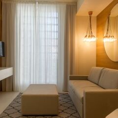 Отель Metropol Ceccarini Suite Риччоне комната для гостей фото 8