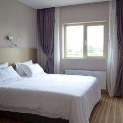 New century hotel комната для гостей