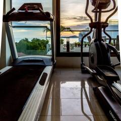 Отель C-View Residence Паттайя фитнесс-зал фото 4