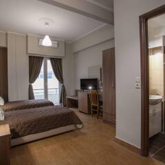 Отель Ambrosia Suites & Aparts Греция, Афины - 2 отзыва об отеле, цены и фото номеров - забронировать отель Ambrosia Suites & Aparts онлайн комната для гостей