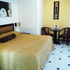 Hotel El Conquistador del Paseo de Montejo комната для гостей фото 5