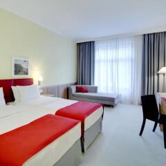 Гостиница Golden Tulip Rosa Khutor (Голден Тюлип Роза Хутор) в Красной Поляне - забронировать гостиницу Golden Tulip Rosa Khutor (Голден Тюлип Роза Хутор), цены и фото номеров Красная Поляна комната для гостей фото 3