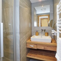 Отель Grunwald Resort Зёльден ванная фото 2