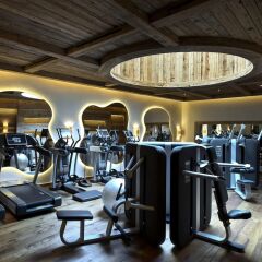 Отель The Alpina Gstaad фитнесс-зал фото 2