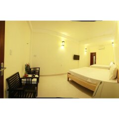 Отель Sunrise Homestay Вьетнам, Хойан - отзывы, цены и фото номеров - забронировать отель Sunrise Homestay онлайн сейф в номере