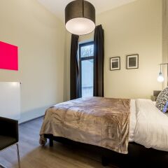 Отель Smartflats Design - Schuman Брюссель комната для гостей