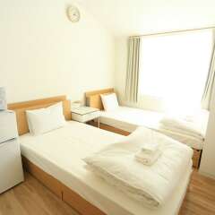 Coins Hostel Tenjin Фукуока комната для гостей фото 5