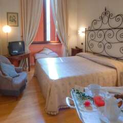 Отель Palazzo Carradori Монтефано в номере