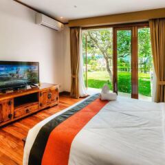 Отель Villa Laguna Phuket 4* Стандартный номер с различными типами кроватей фото 14