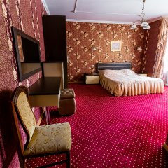 Гостиница Эльбрусия в Терсколе 2 отзыва об отеле, цены и фото номеров - забронировать гостиницу Эльбрусия онлайн Терскол комната для гостей фото 2