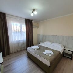 Гостиница Гостевой Дом Каприз в Анапе отзывы, цены и фото номеров - забронировать гостиницу Гостевой Дом Каприз онлайн Анапа комната для гостей фото 5