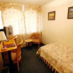 Приморье во Владивостоке 8 отзывов об отеле, цены и фото номеров - забронировать гостиницу Приморье онлайн Владивосток комната для гостей фото 4