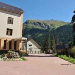Гостиница Домбай Пэлас вид на фасад фото 3
