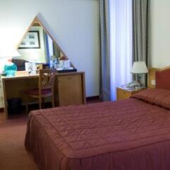 Отель NH Milano Touring 4* Стандартный номер с различными типами кроватей фото 27