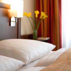 Отель NH Collection Frankfurt City 4* Стандартный номер с различными типами кроватей фото 11