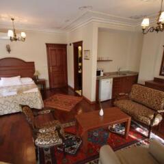 Апартаменты Tashkonak Sultan Suites and Apartments Люкс с различными типами кроватей фото 42