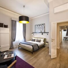 Отель The Independent Suites Стандартный номер с различными типами кроватей