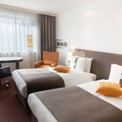 Гостиница Holiday Inn Almaty Алматы комната для гостей фото 4