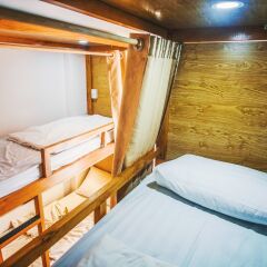 Dola Hostel Кровать в общем номере с двухъярусной кроватью