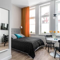 Апартаменты Sanhaus Apartments - Fiszera Люкс с различными типами кроватей