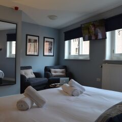 Отель Frisco Inn Номер Делюкс с различными типами кроватей
