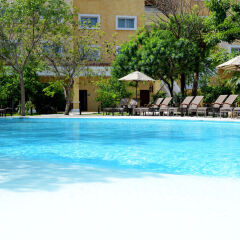 Отель Courtyard By Marriott Cancun Airport Мексика, Канкун - отзывы, цены и фото номеров - забронировать отель Courtyard By Marriott Cancun Airport онлайн открытый бассейн фото 2